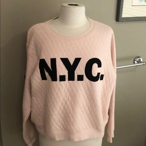 NWT.  H & M pink sweatshirt with NYC on front